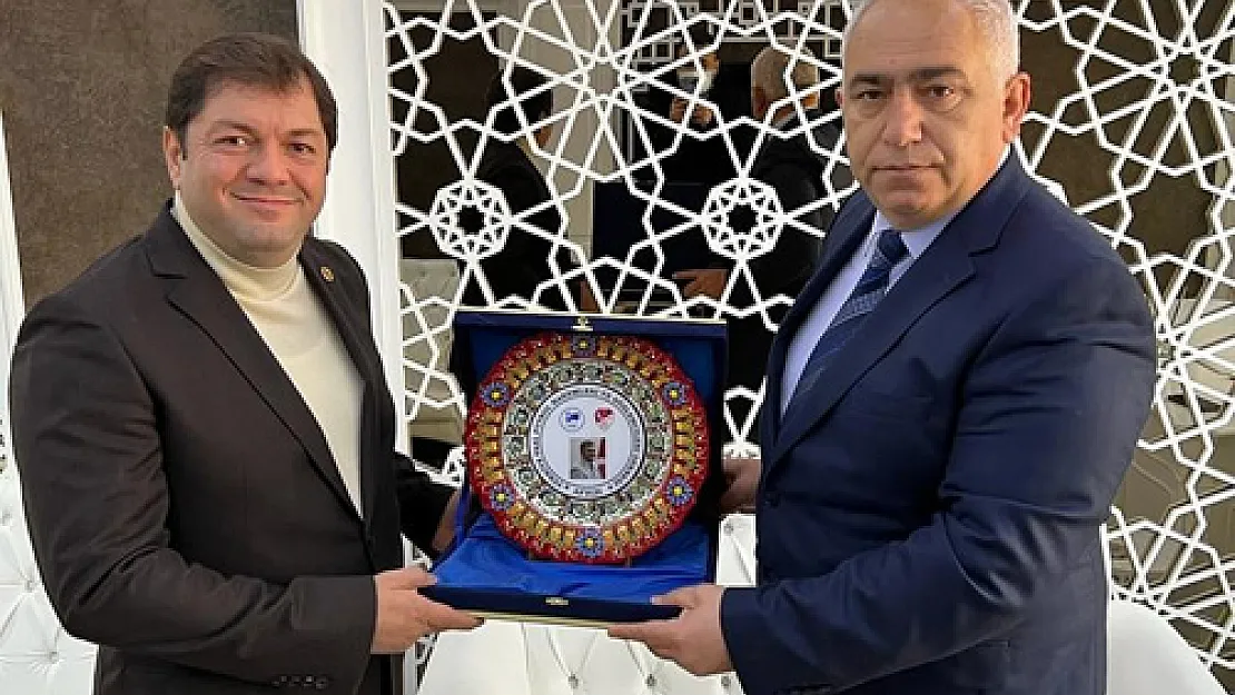 Güneş'ten Güzbey'e plaket