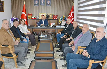 AFYAŞAD'dan Kahveci'ye Tebrik Ziyareti