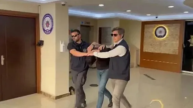 Camide içki şişesiyle fotoğrafa 7 ay 15 gün hapis