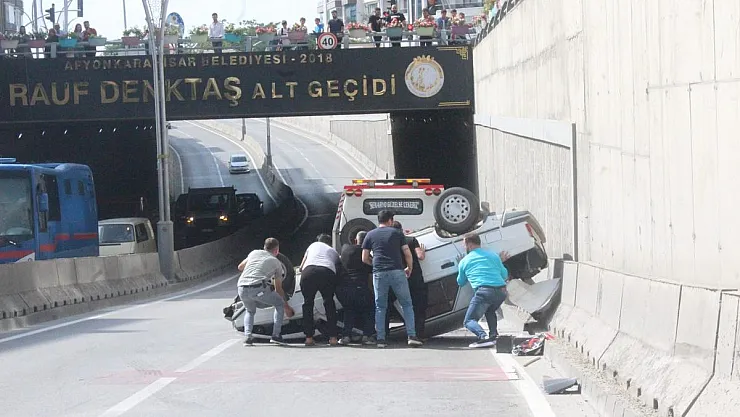 Takla atan otomobilde 2 kişi yaralandı